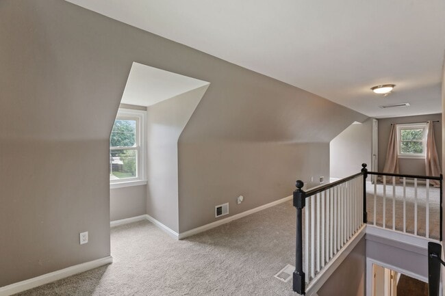 Building Photo - Move-In Ready Cape Cod with 3 Finished Levels & Huge Backyard