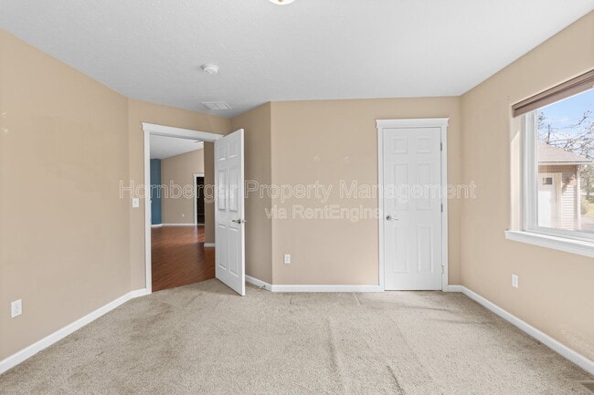 Building Photo - 6929 N Country Homes Blvd