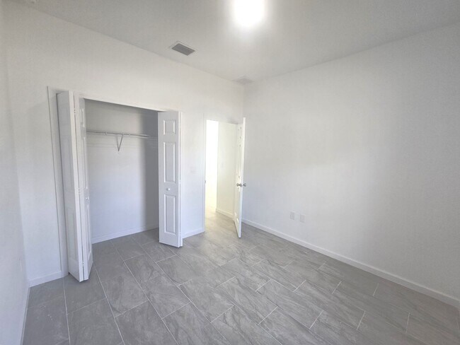 Building Photo - Brand New 4/2/2- South Lehigh Acres