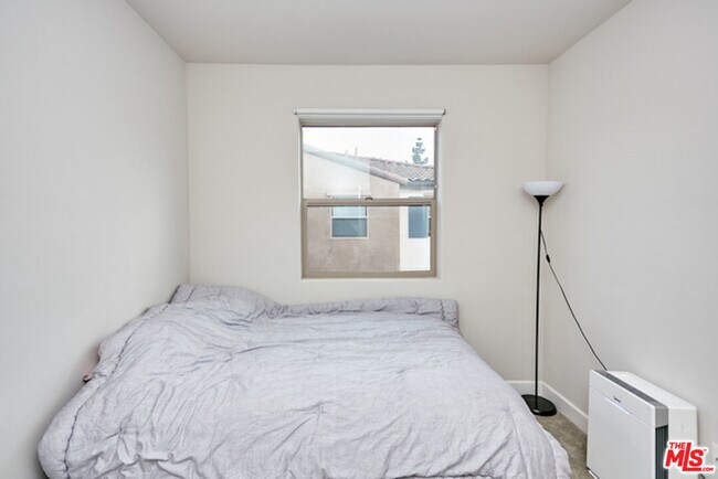 Building Photo - 9831 Alburtis Ave