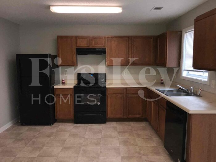 Building Photo - 7114 Ravenwood Ln
