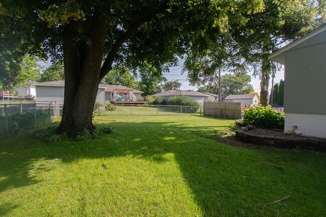 Building Photo - Cape Cod style home - completely updated throughout!