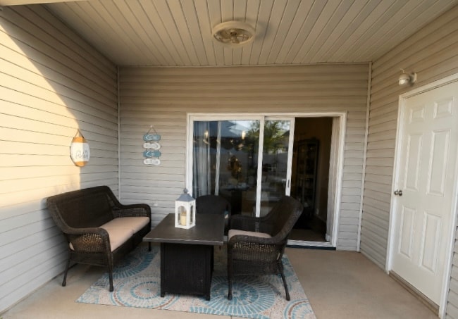 Large covered back patio with small storage unit - 238 Yorktown Ln