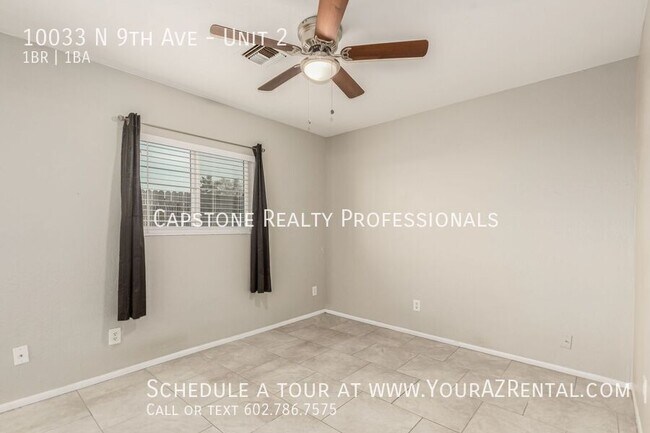 Building Photo - 10033 N 9th Ave