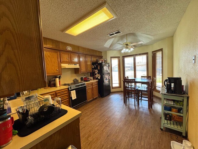 Building Photo - Available July 10th with storage shed & all appliances included!