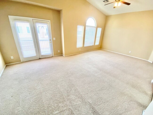 Building Photo - OVELY  2 BED ROOM 2 BATHROOM TOWNHOES LOCATED IN A GATED COMMUNITY IN HENDERSON