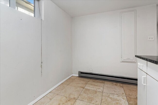 Building Photo - Javid Properties Triplex