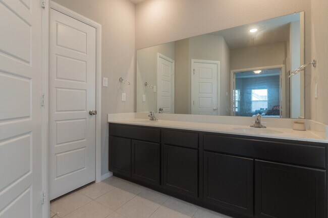 Building Photo - Gorgeous Two Story Home Featuring 2 Living spaces, 5 Bedrooms, and 3.5 Baths