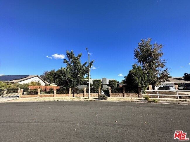 Building Photo - 10850 Remmet Ave