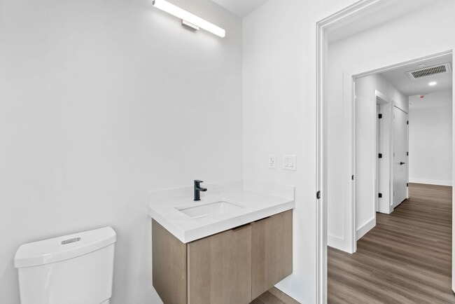 Building Photo - 2 Bedroom Corner-Unit with Wooded Balcony ...