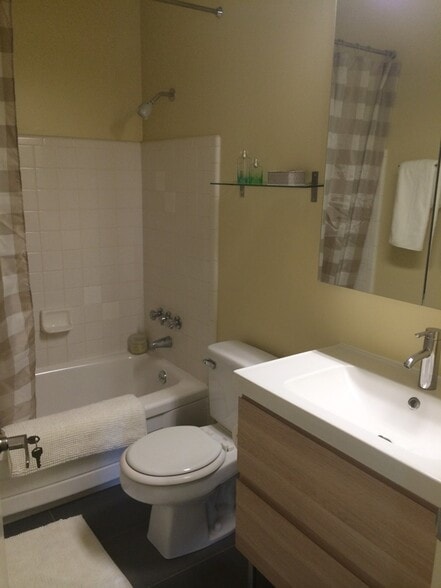 Updated bathroom with Italian tile floor - 3833 Maybelle Ave