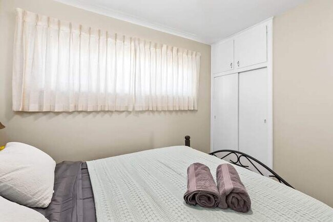 Building Photo - Cozy 2BR Home with Bright Interior & Relaxing Patio