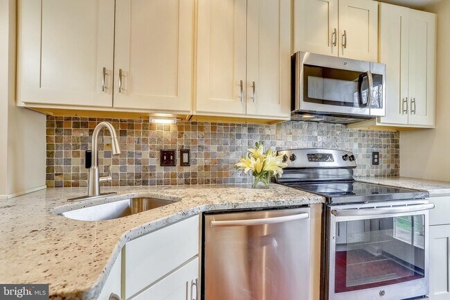 Ample storage and soft-close cabinets. - 1415 E Abingdon Dr