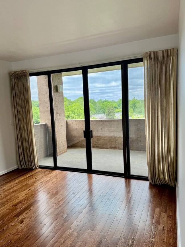 Building Photo - Experience Luxury and Prestige at Yorktown Condominiums