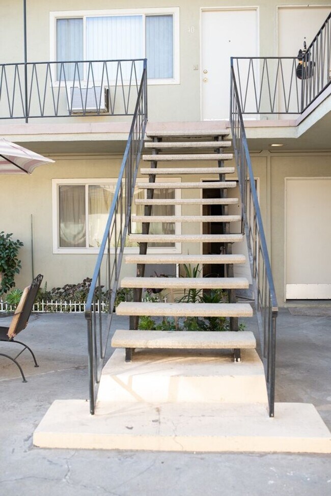 Building Photo - 1/2 OFF FIRST MONTH'S RENT studio with ALL UTILITIES PAID!