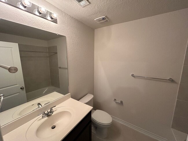 Building Photo - *COMING SOON* 3-Bedroom with Solar Panels & Resort Amenities – Pool, Gym!