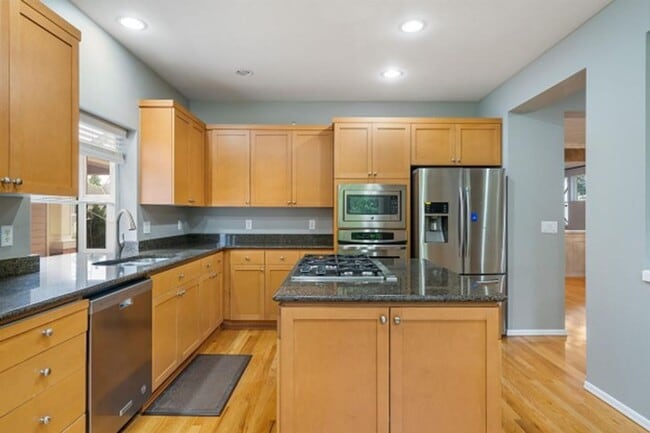 Building Photo - A Beautiful Picture Perfect Home with 4 Be...
