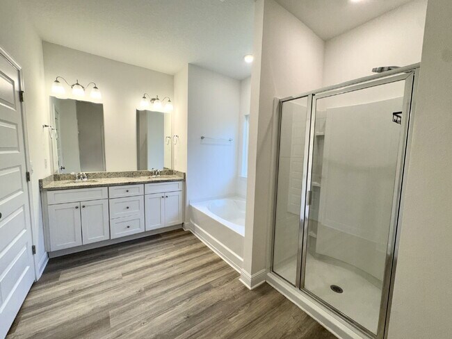 Building Photo - This gorgeous new construction home in Ward Creek overlooks a protected nature preserve.