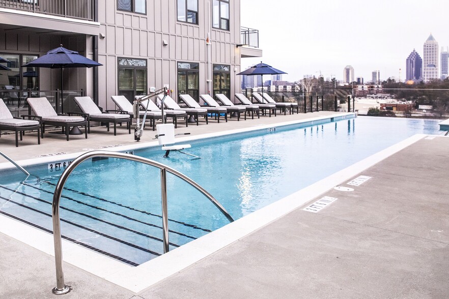 Infinity pool with Midtown skyline views. - Windsor Interlock