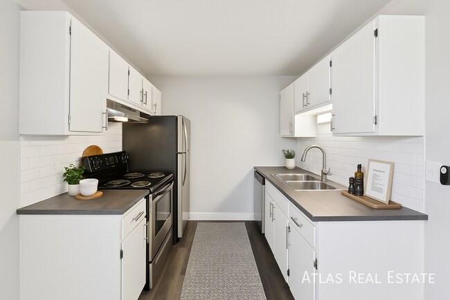 Building Photo - 7155-103 N Raleigh Street-103