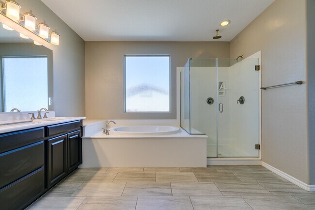 Building Photo - Beautiful Next-Gen Home with Private Entry Suite & Spacious Backyard