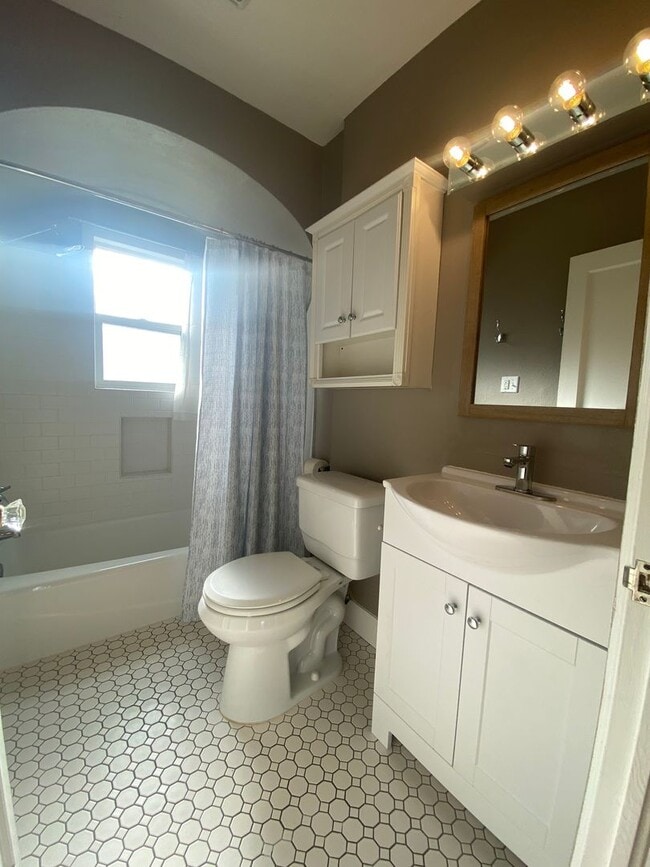 Building Photo - Perry District Gem – Move-In Ready 3 plus Bed / 2 Bath Brick Home with Finished Basement & 2-Car ...