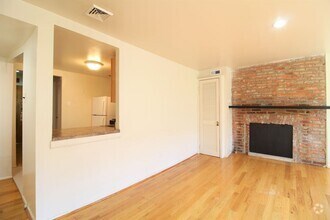 Building Photo - Spacious 2 BR 2 BA w/ Decorative Fireplace...