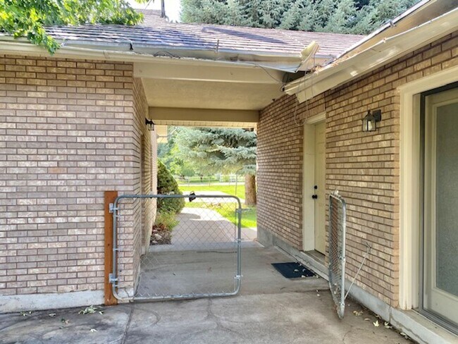 Building Photo - Beautiful home single level entry with out buildings and amazing landscaping - shorter term lease...