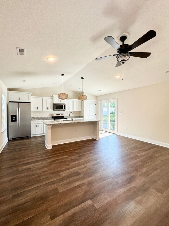 Building Photo - BEAUTIFUL pond front home! All the details make this a showstopper.! Fenced Yard!!