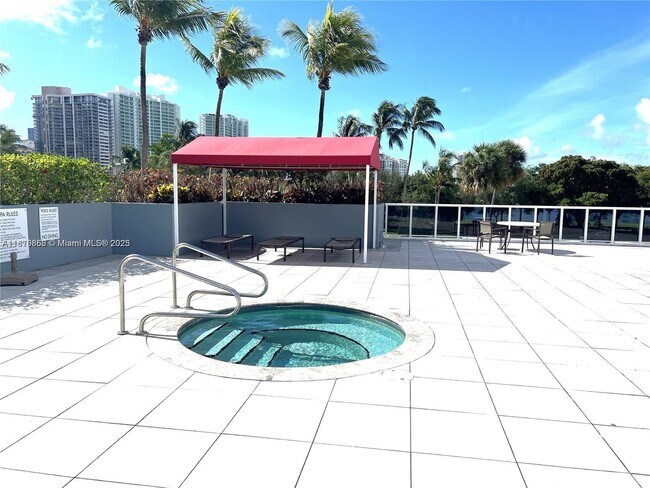 Building Photo - 3675 N Country Club Dr
