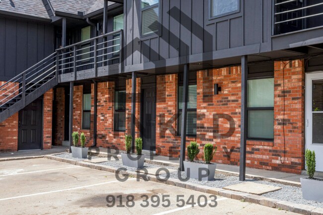 Building Photo - 3711 S Indianapolis Ave