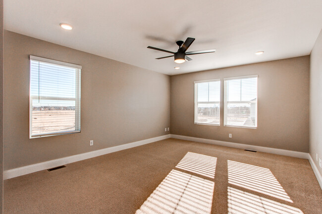 Oversized master bedroom with Denver skyline views - 2656 W 68th Pl