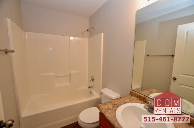 Building Photo - Wonderful Waukee Townhome