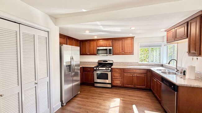 Building Photo - Beautiful Craftsman-style Home with fenced yard space, detached garage and additional parking in ...