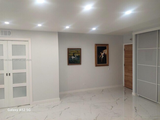 Building Photo - 5005 Collins Ave