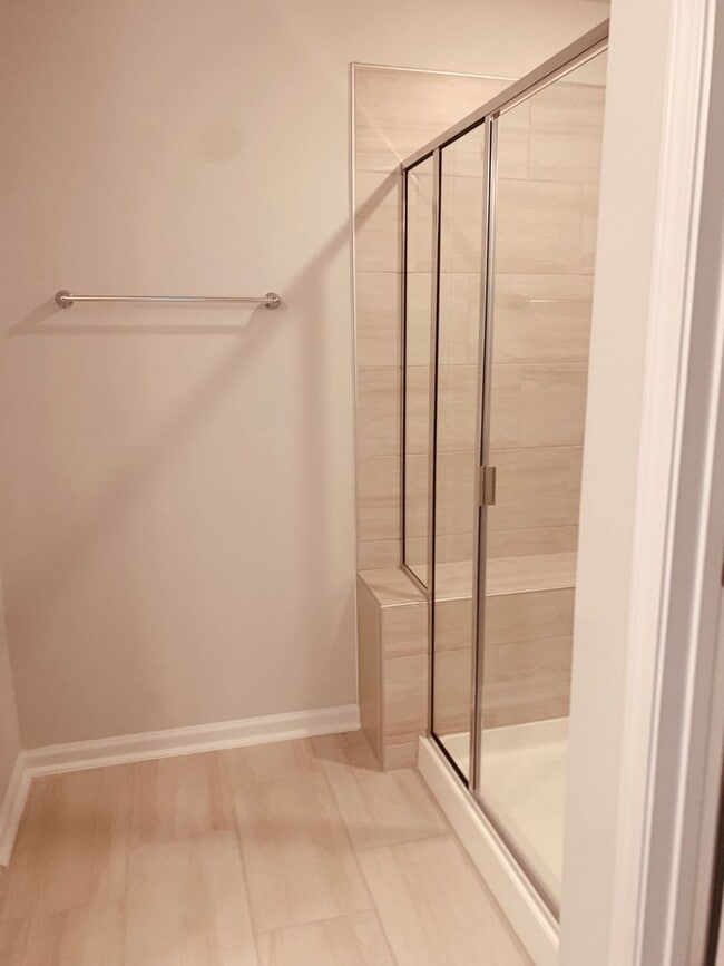 Building Photo - BRAND NEW TOWNHOME! 2 CAR GARAGE. SCREENED IN PORCH. MODERN KITCHEN. OPEN CONCEPT LIVING. BONUS ROOM