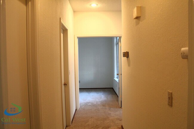 Building Photo - $2,495 - Upstairs 2 Bedroom/1 Bath Condo