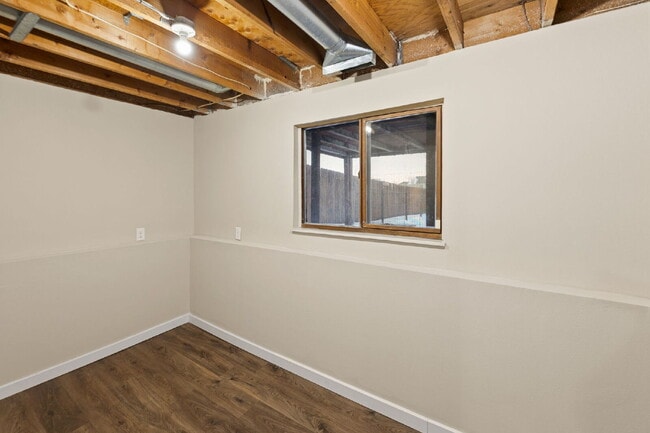 Building Photo - Spacious Split-Level Home with Finished Basement, Deck, Fenced Yard & 2-Car Garage