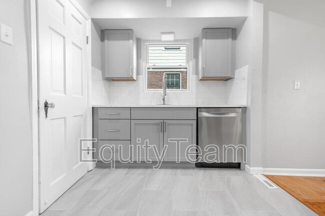 Building Photo - 6819 Elwynne Dr