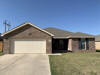 Building Photo - Solar Panels and Alarm System Included!!