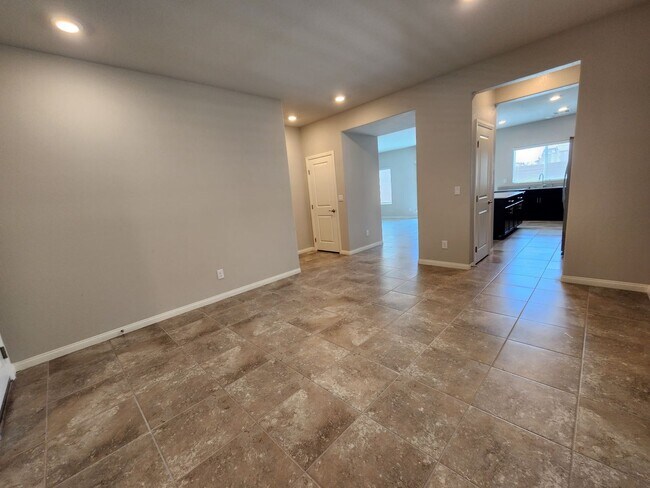 Building Photo - A Fairly New Home with 5 Bedrooms in a gated community