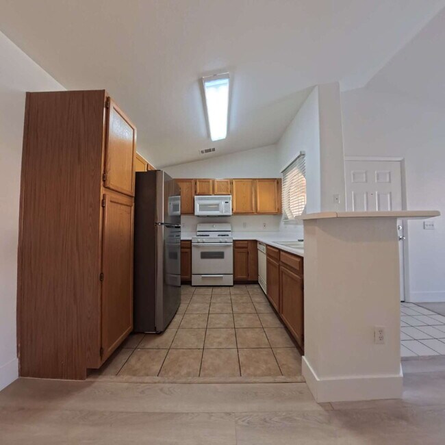 Building Photo - Upgraded 1 Bed 1 Bath Second-Story Condo at Opulence!