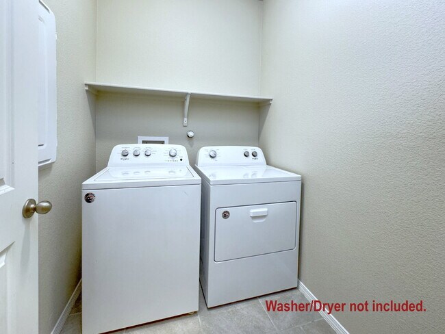 Building Photo - Only 4 years new!