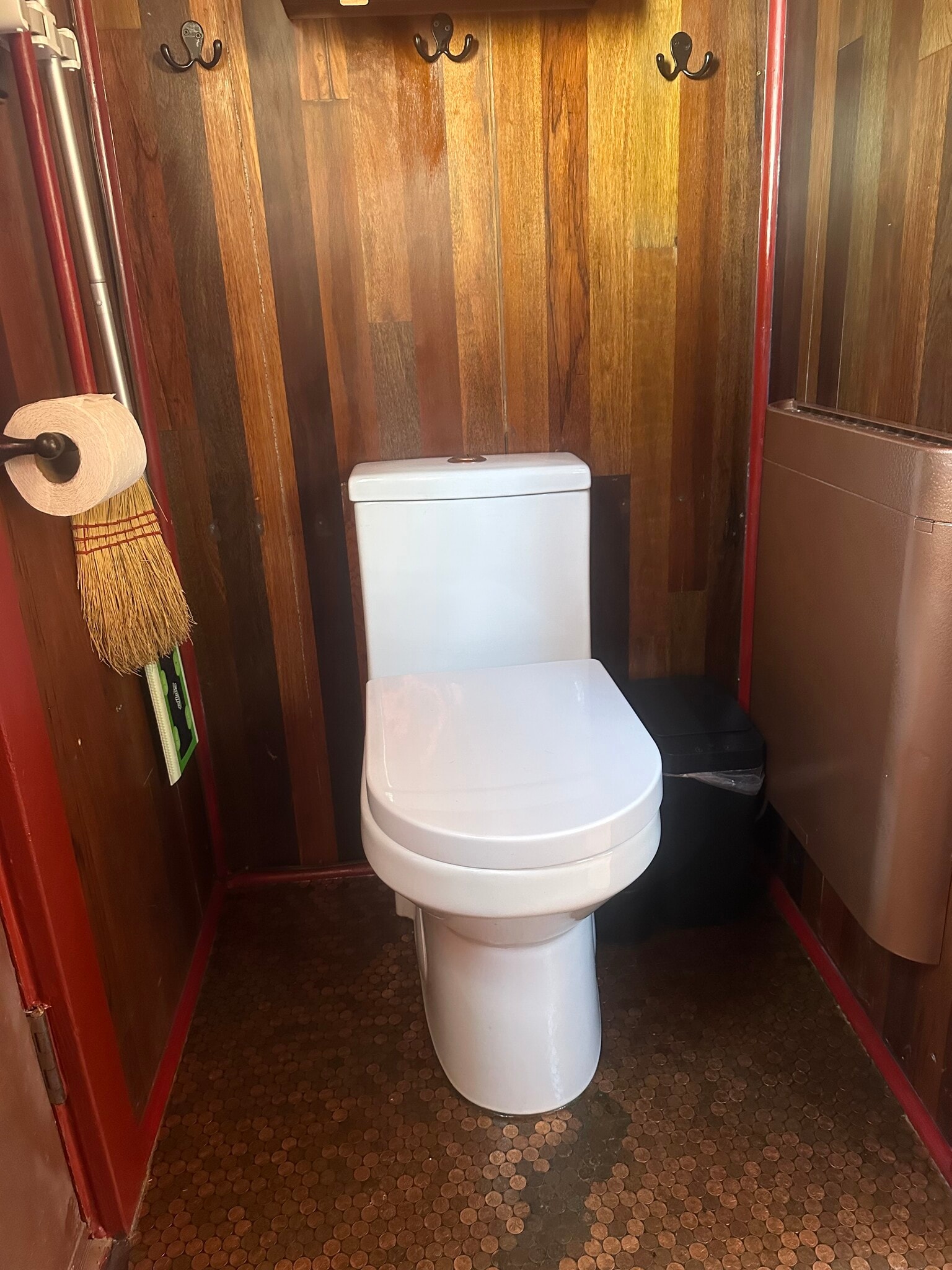 The dual flush toilet and wall mounted silent convection heater are water and energy saving features - 833 Valencia St