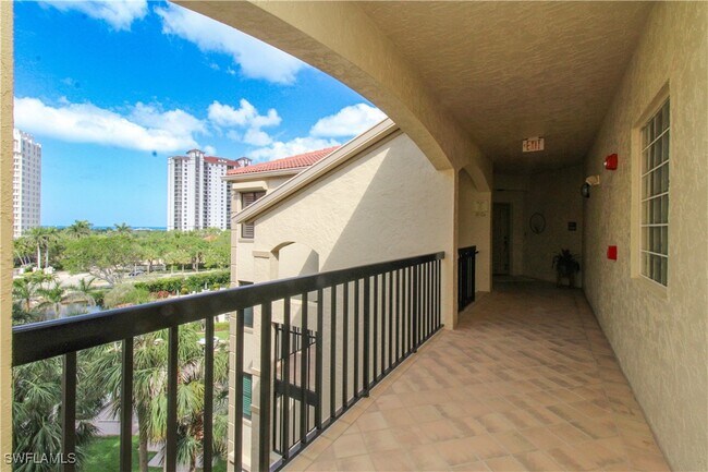 Building Photo - 7024 Pelican Bay Blvd