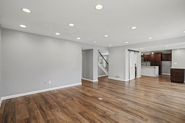 Building Photo - Updated 4BR Corner Lot Home with Finished Basement & 2-Car Garage