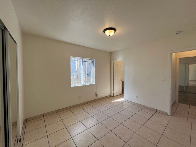 Building Photo - 8416 1/2-8416 1/2 Graham Ave