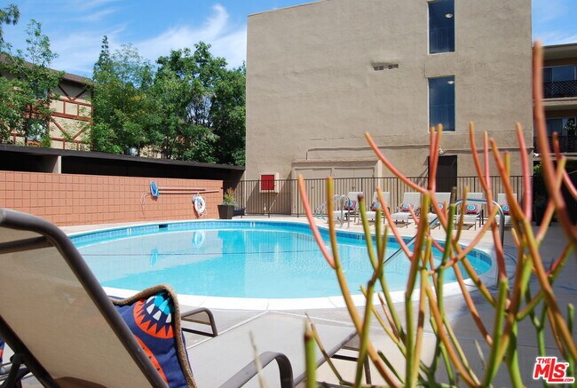 Building Photo - 10200 De Soto Ave