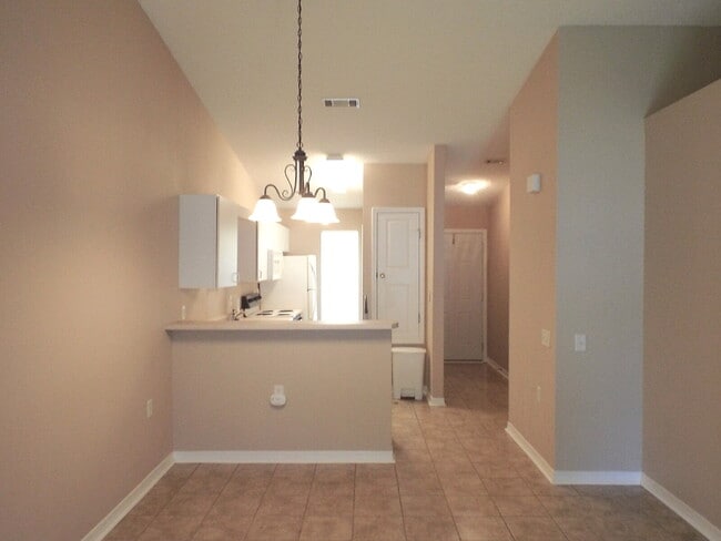 Building Photo - 2BR/1BA with Fenced Yard – Lawn Care Inclu...