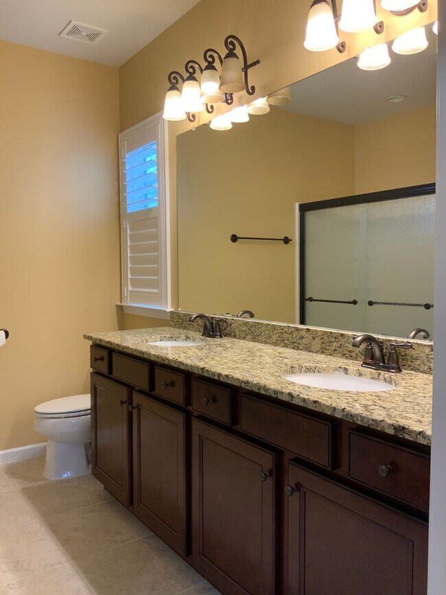Building Photo - Move in ready in a wonderful Active 55+ Ad...